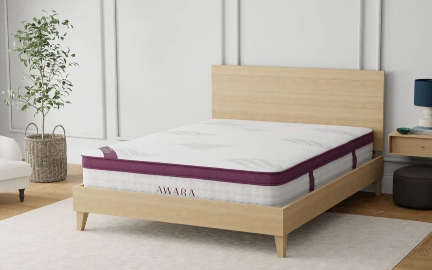 Purple and white Awara mattress on a light wooden bedframe