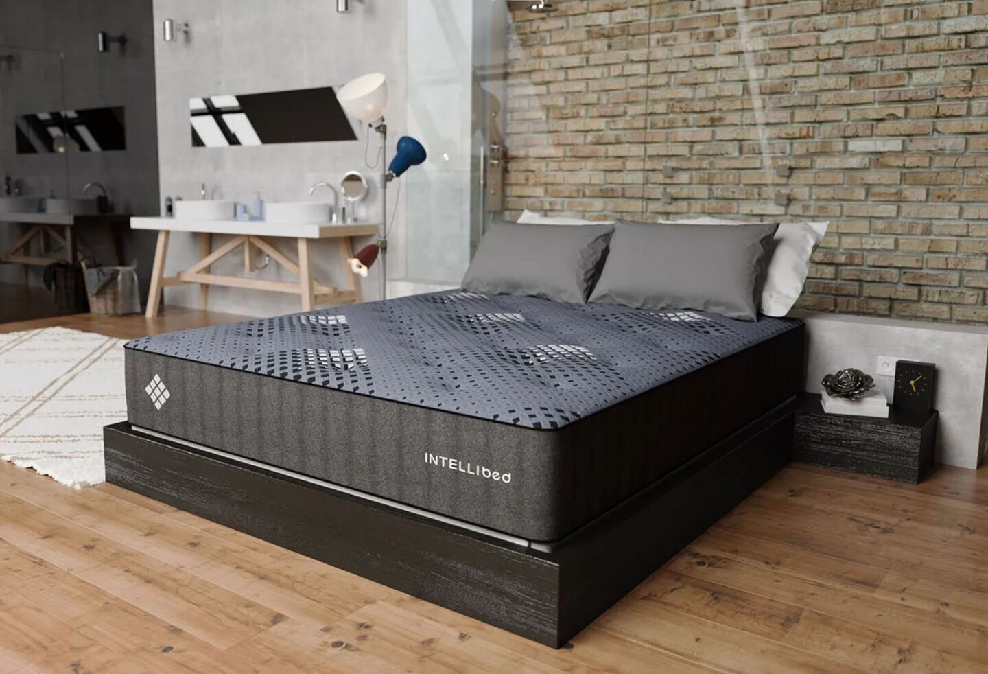 Navy blue Intellibed mattress on a black wooden bedframe in a bedroom