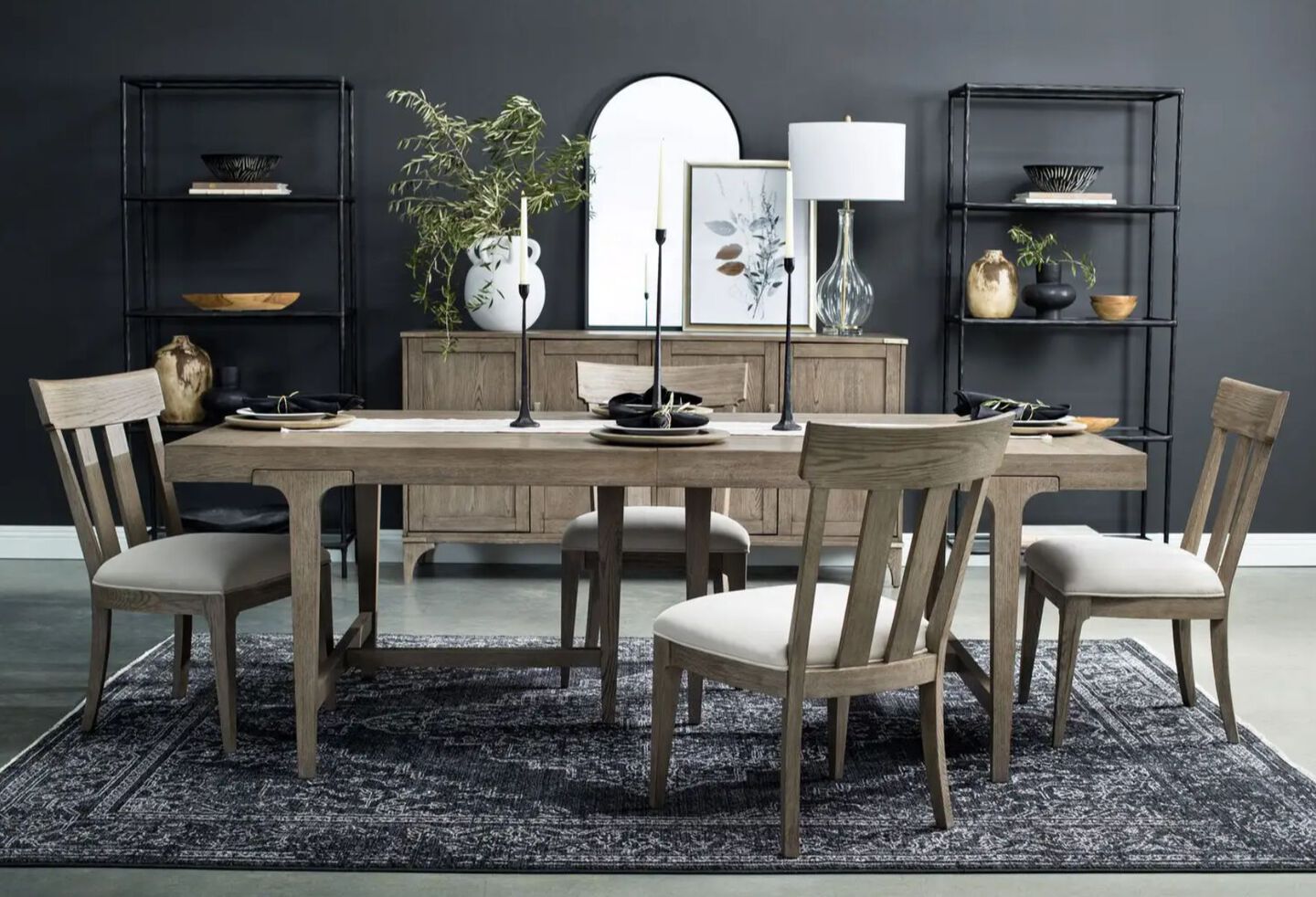 Dining room with a greige table and matching upholstered dining chairs