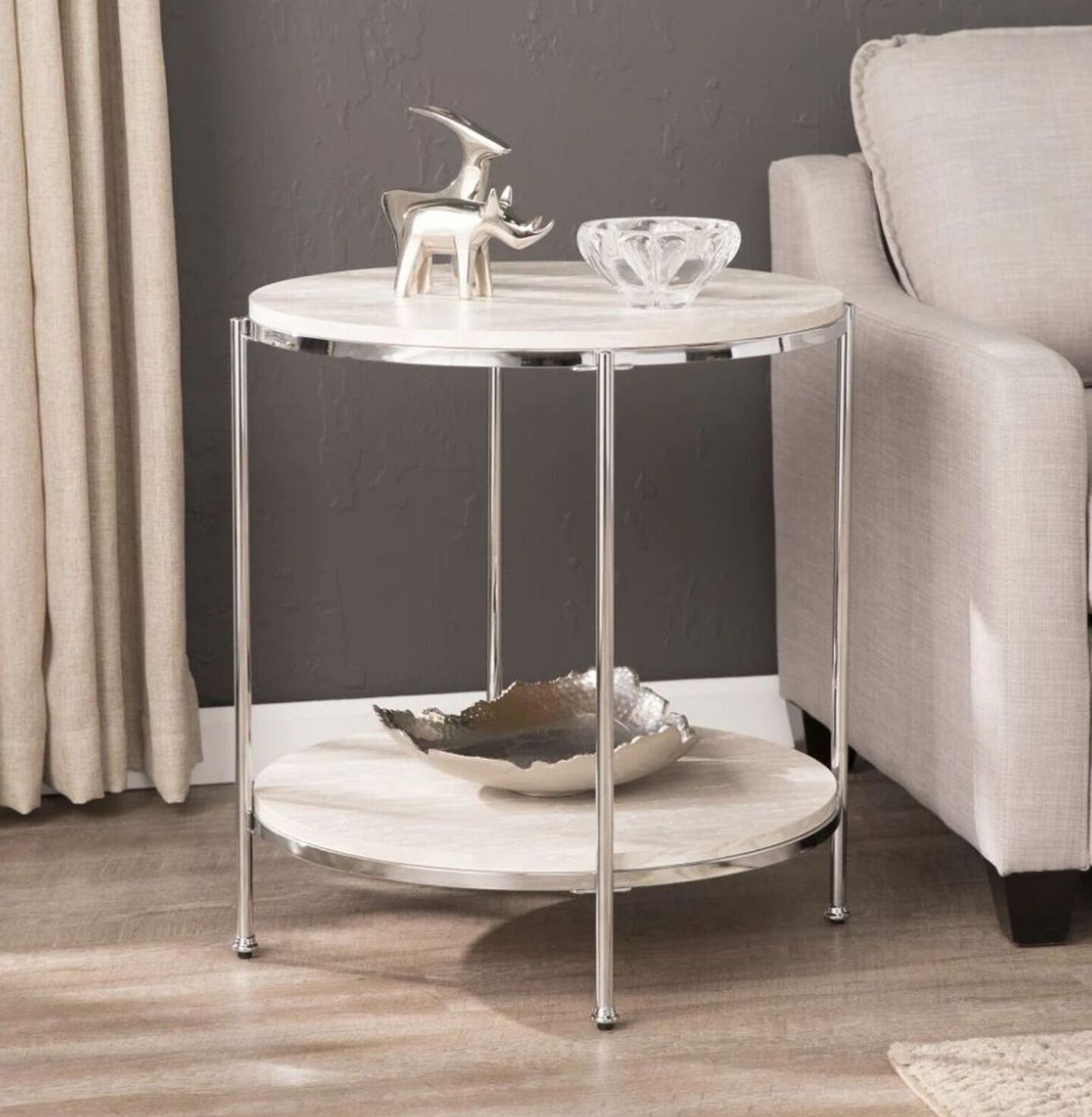 White marble two tiered table with silver metallic hardware