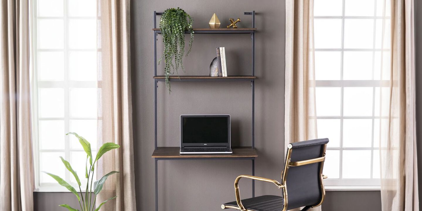 Office space with a vertical desk with shelves and swivel chair