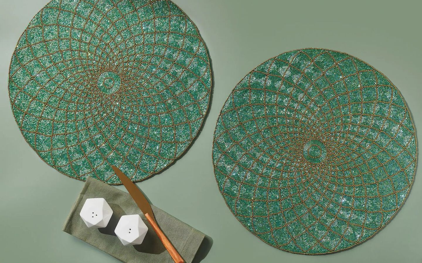Closeup image of two green beaded placemats