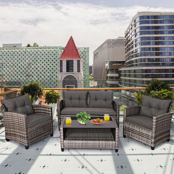 Mondawe 4 Pieces Patio Rattan Furniture Set with Coffee Table and Cushioned Sofa