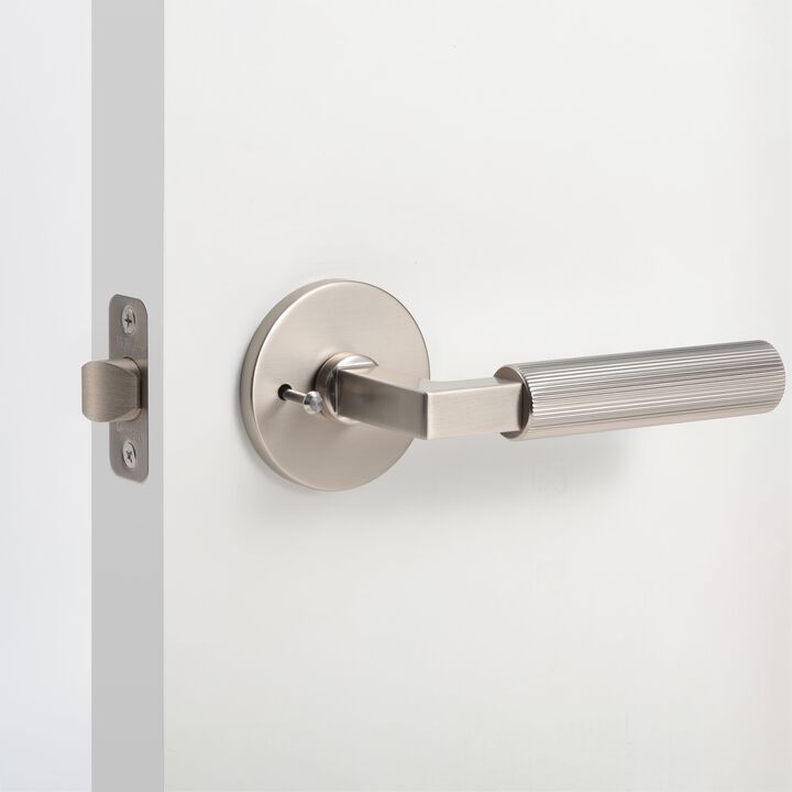 Mila Modern Linear Bed/Bath Interior Door Handle with Round Rosette and Concealed Screws (Privacy)