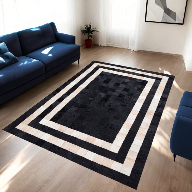 Cream Cowhide Patchwork Rug with Black Frame image number 5