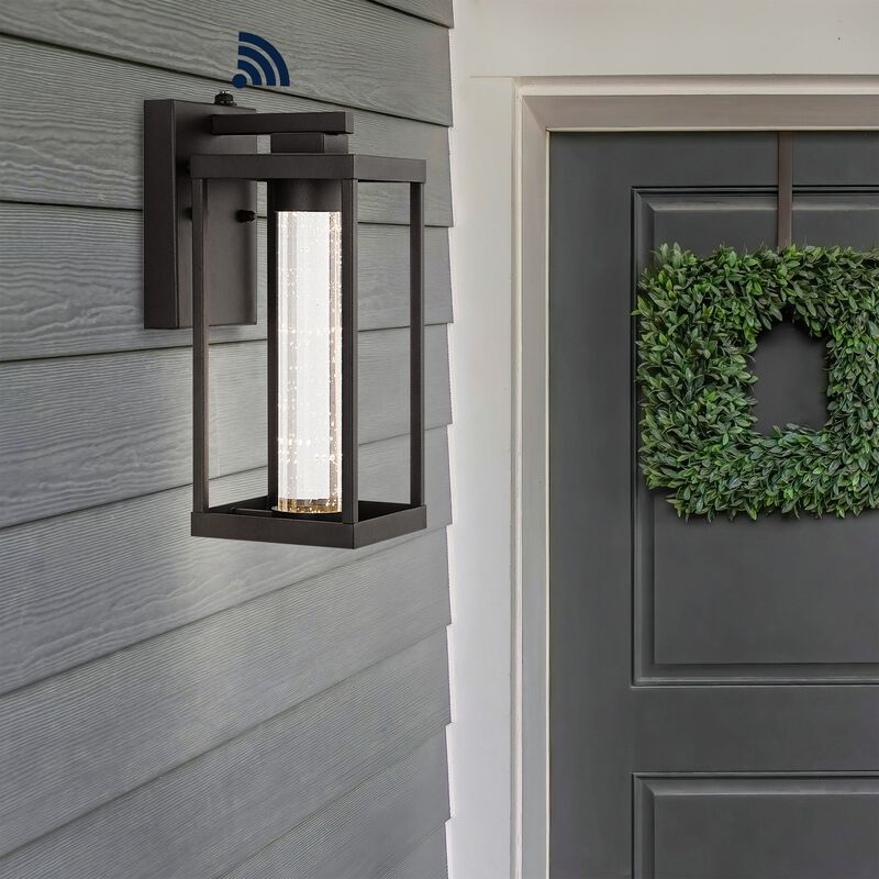 Juno Industrial Vintage Iron/Glass Seeded Glass with Dusk-to-Dawn Sensor Integrated LED Outdoor Sconce