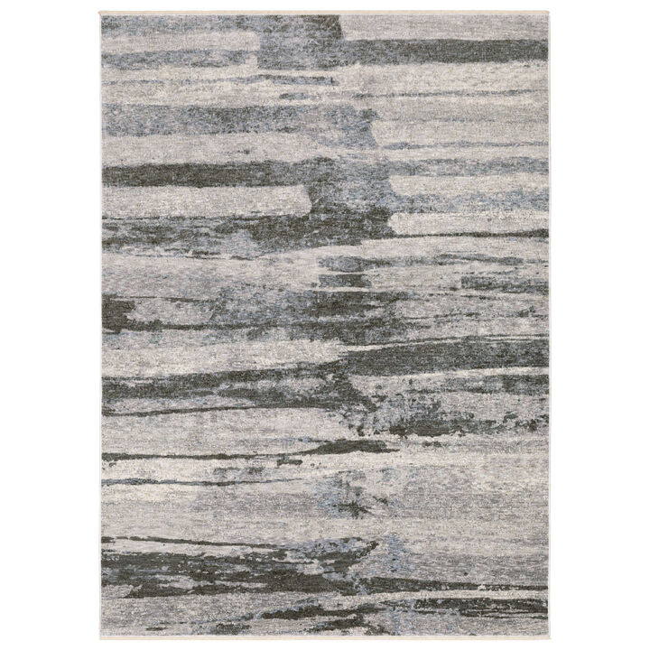HomeRoots Abstract Area Rug With Fringe
