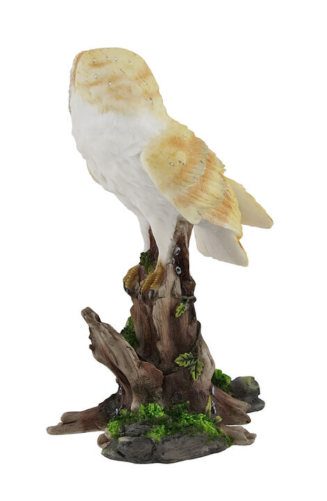 Barn Owl Vigilantly Perched on Tree Stump Statue
