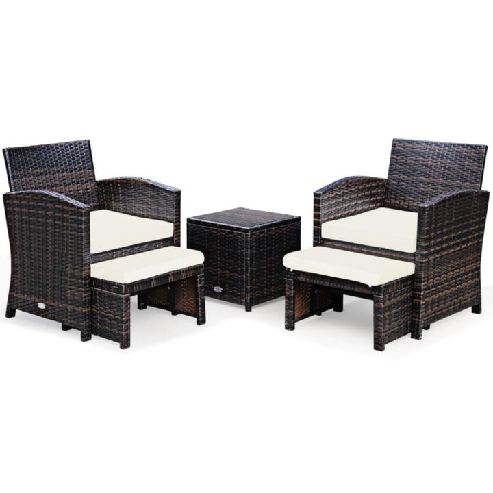 Hivvago 5 Pieces Patio Rattan Furniture Set with Ottoman and Tempered Glass Coffee Table