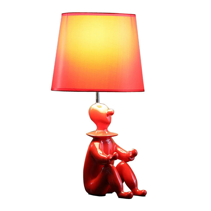 Fabric Shade Table Lamp with Polyresin Sitting Clown Base, Red - Benzara