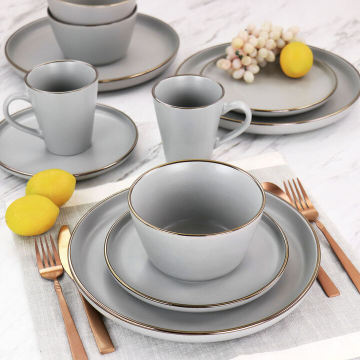 Elama Louis 16 Piece Stoneware Dinnerware Set in Matte Slate with Gold Rim