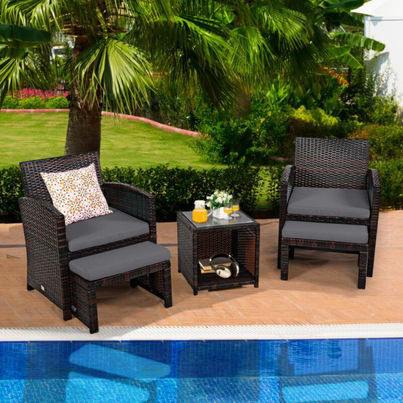 Hivvago 5 Pieces Patio Rattan Furniture Set with Ottoman and Tempered Glass Coffee Table