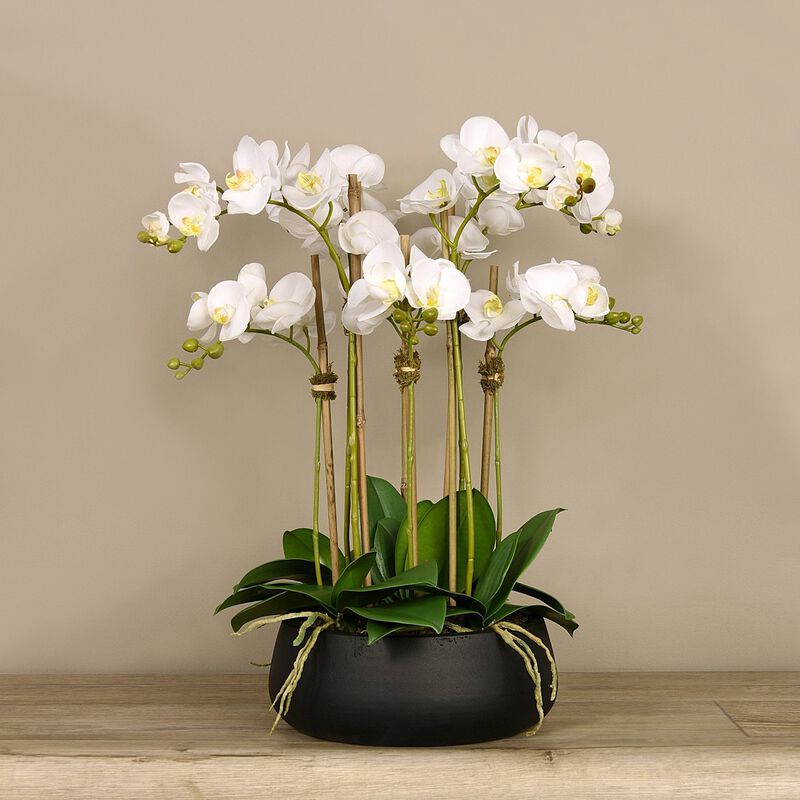 Faux floral arrangement - white orchid centerpiece in black vase