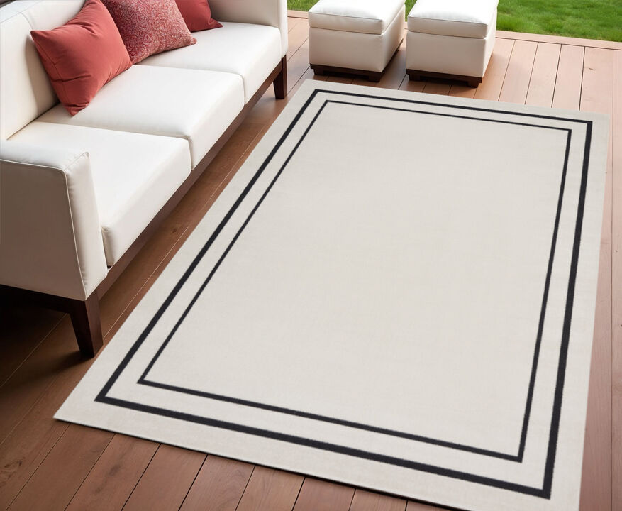 HomeRoots 4' X 6' Ivory And Black Indoor Outdoor Area Rug