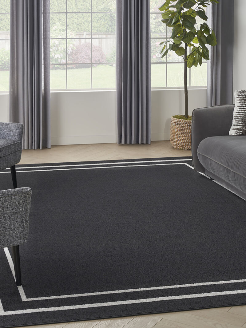 Nourison Essentials NRE02 Black/Ivory 9' x 12' Rug