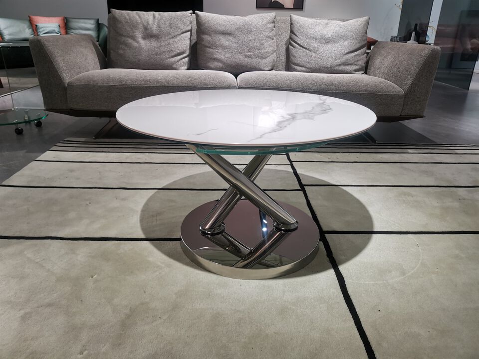 Motion coffee table with one ceramic top and one clear glass top