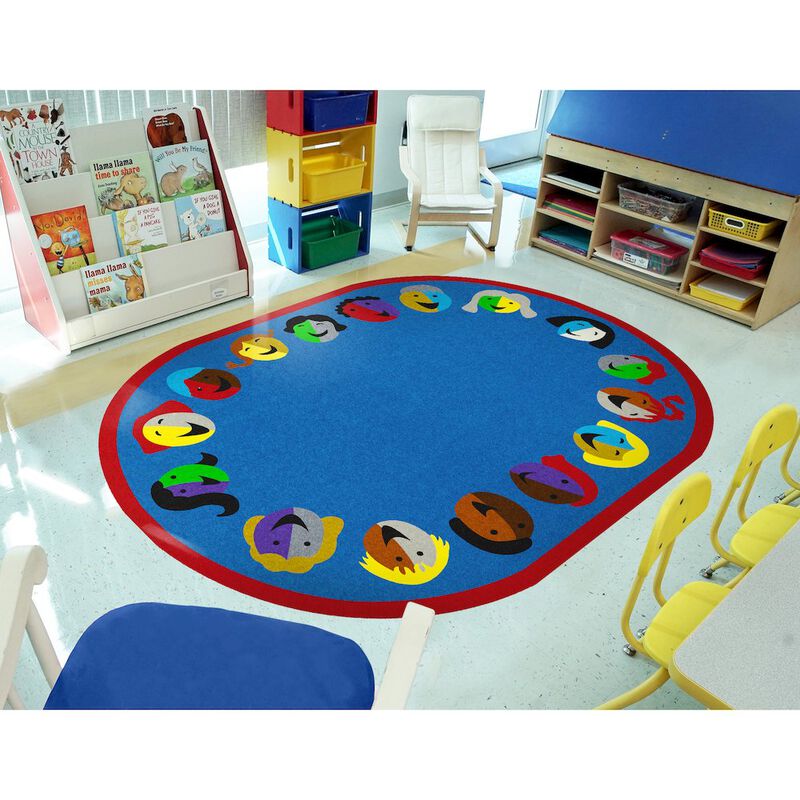 Joy Carpets Kid Essentials Joyful Faces 7'8 x 10'9 Oval Area Rug in Color Blue