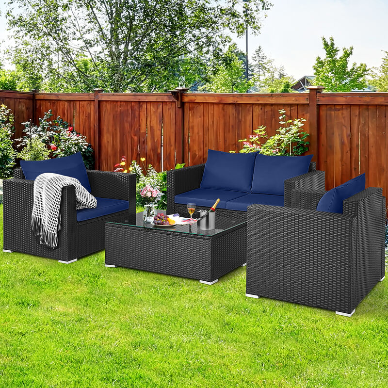 4 Pieces Patio Rattan Conversation Set with Padded Cushion and Tempered Glass Coffee Table