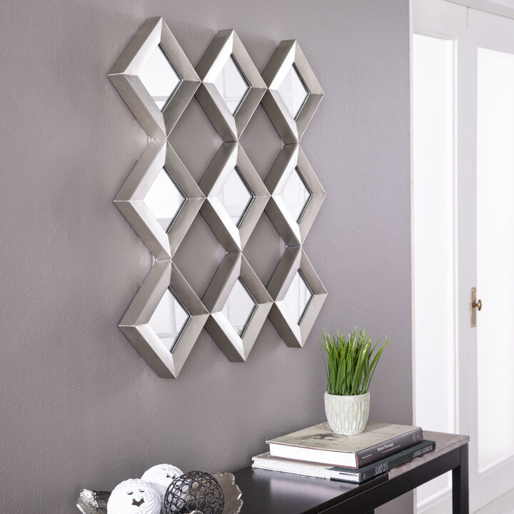 nine diamond-shaped mirrors connected, making an overall square shape as wall art