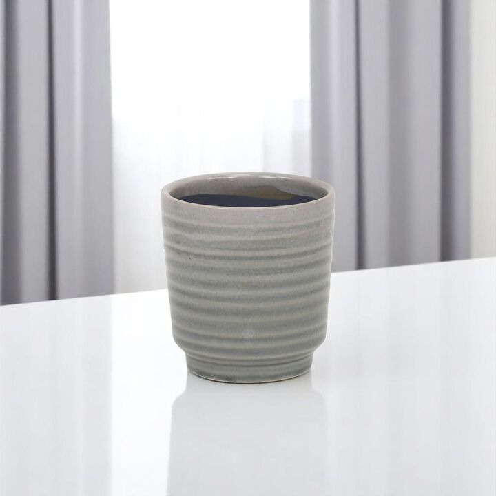 HomeRoots Blue Ceramic 22 Ounce Striped Round Distressed Pot Planter