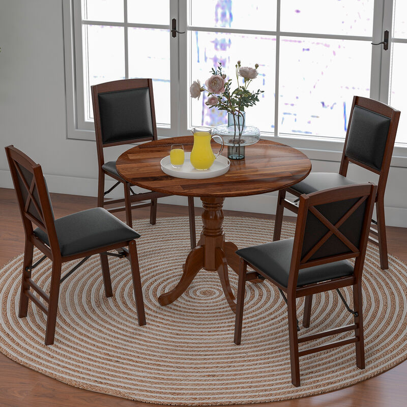 Wooden Dining Table with Round Tabletop and Curved Trestle Legs.