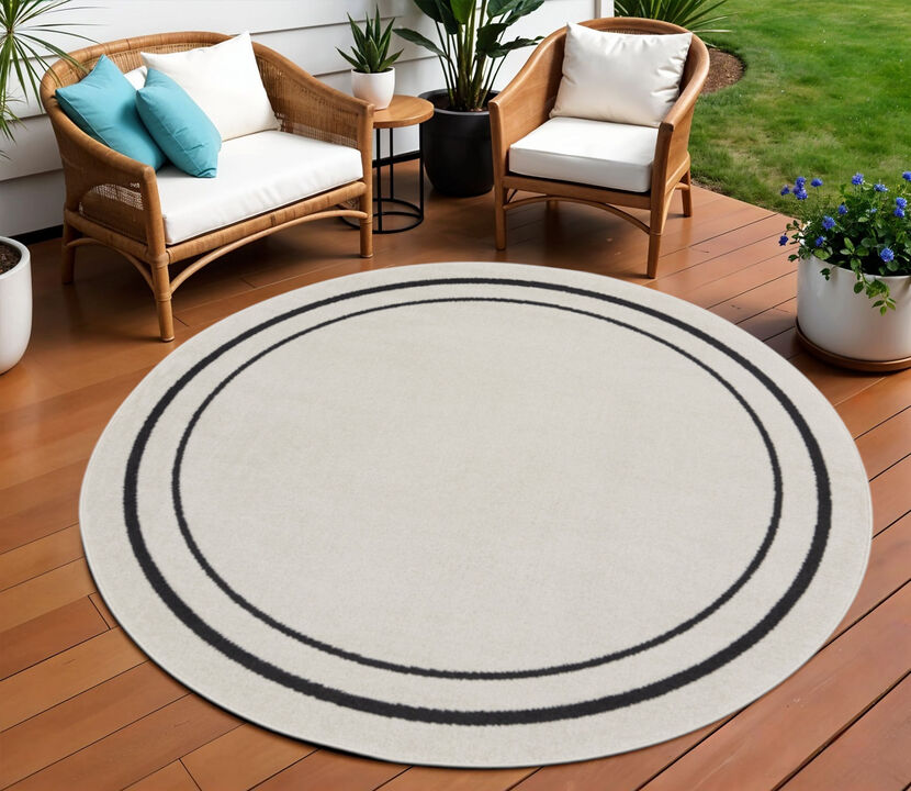 HomeRoots 8' Ivory And Black Round Indoor Outdoor Area Rug