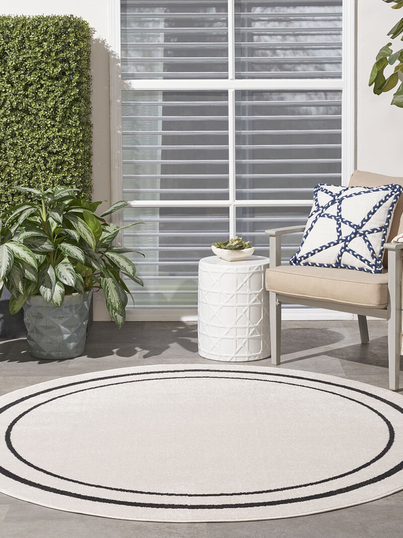 Nourison Essentials NRE02 Ivory/Black 8' x Round Rug image number 1