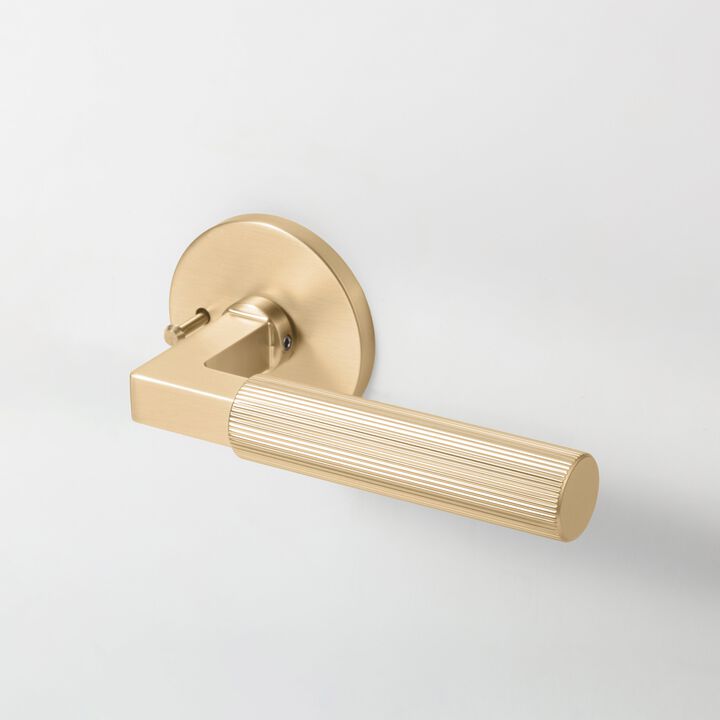 Mila Modern Linear Bed/Bath Interior Door Handle with Round Rosette and Concealed Screws (Privacy)