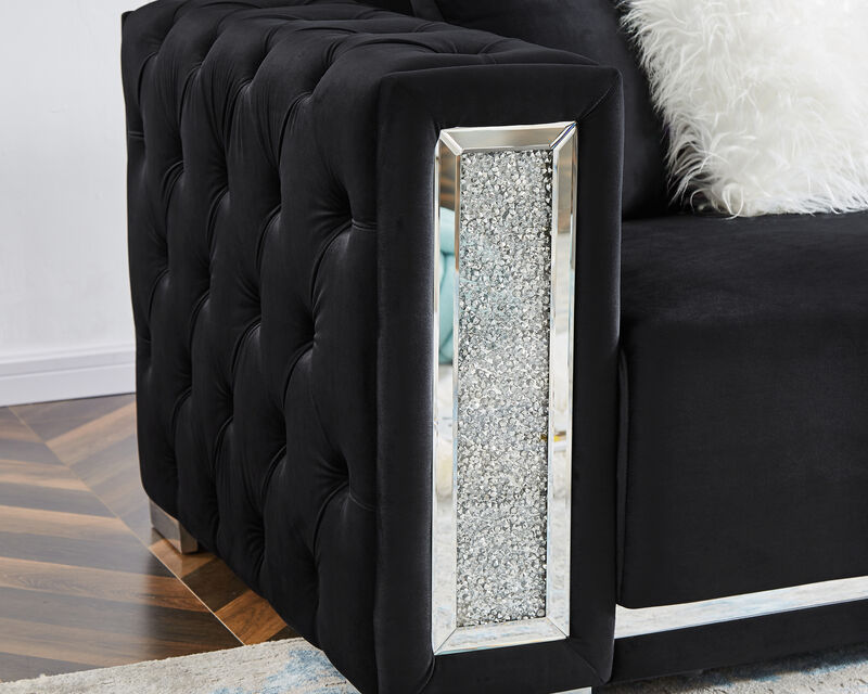 Two-seater black velvet sofa
