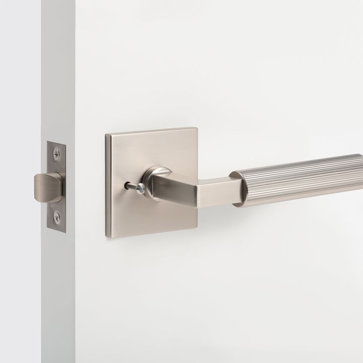 Mila Modern Linear Bed/Bath Interior Door Handle with Square Rosette and Concealed Screws (Privacy)