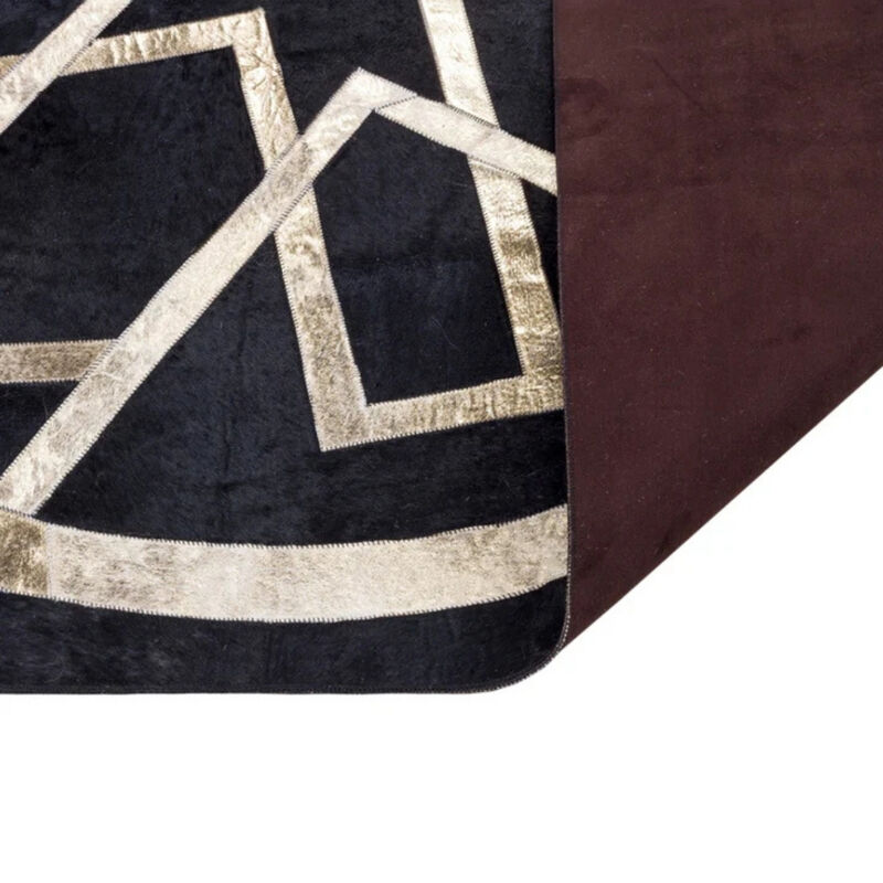 Black Cowhide Patchwork Rug Gold Geometric Design image number 3