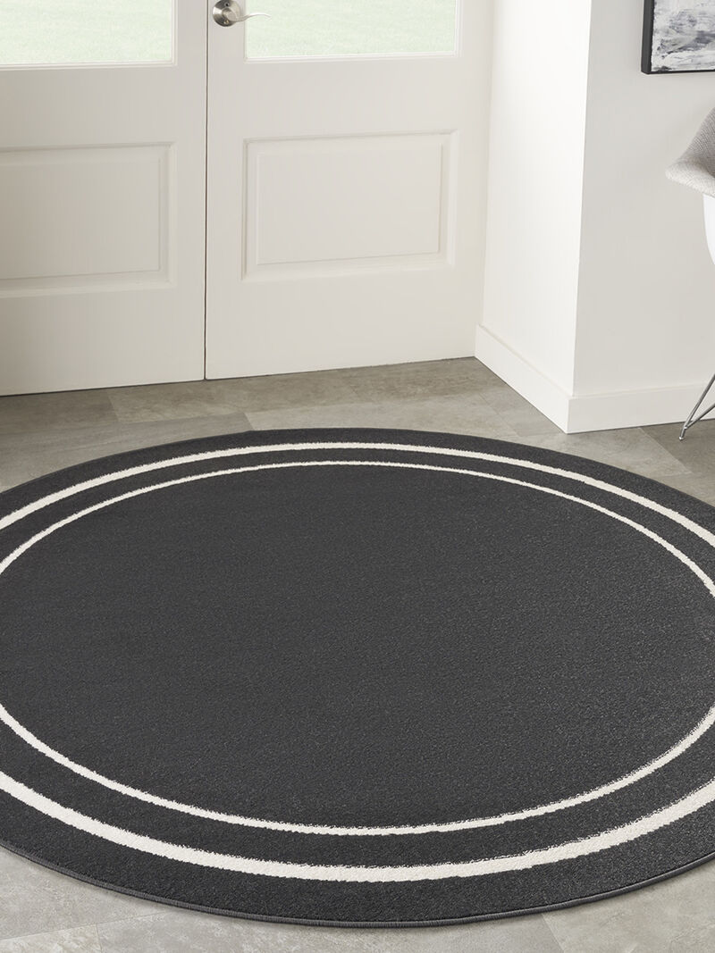 Nourison Essentials NRE02 Black/Ivory 8' x Round Rug