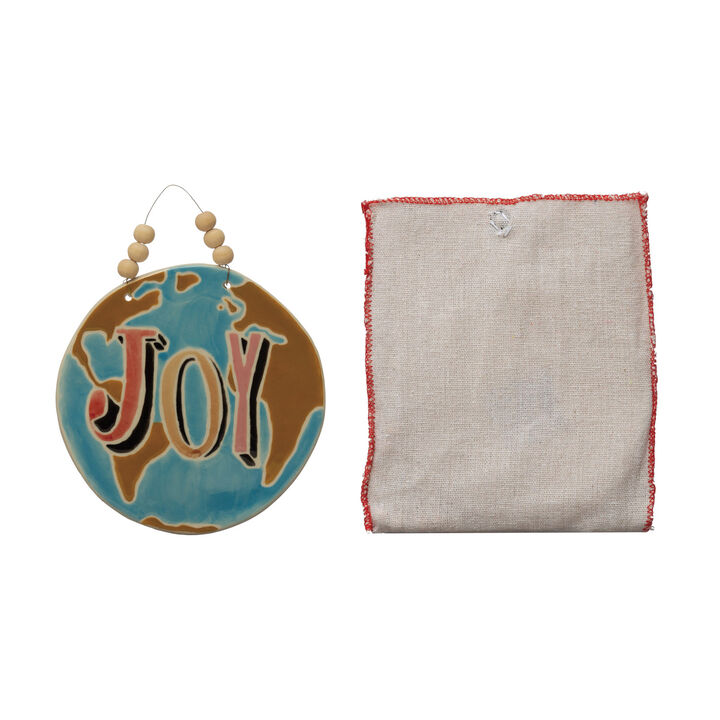 Round Handmade Stoneware Ornament with Wax Relief "Joy" in Linen Bag, Multicolor