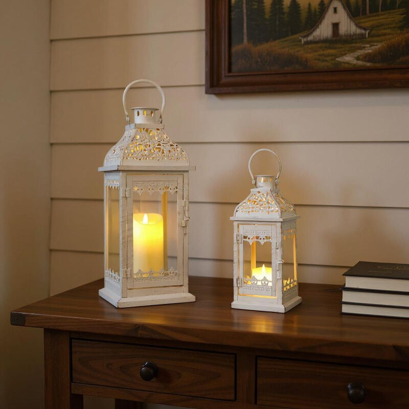 HomeRoots Set of Two Cream Distressed Filigree Metal Tabletop Lantern Candle Holders image number 1