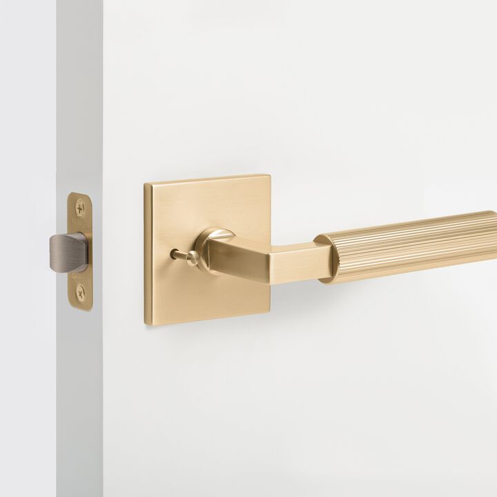 Mila Modern Linear Bed/Bath Interior Door Handle with Square Rosette and Concealed Screws (Privacy)