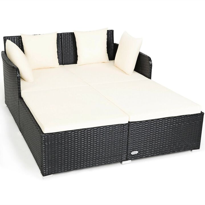 Mondawe Spacious Outdoor Rattan Daybed with Upholstered Cushions and Pillows