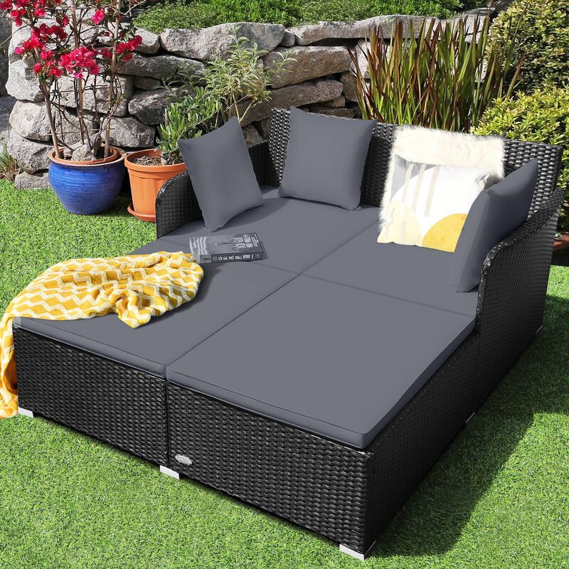 Mondawe Spacious Outdoor Rattan Daybed with Upholstered Cushions and Pillows