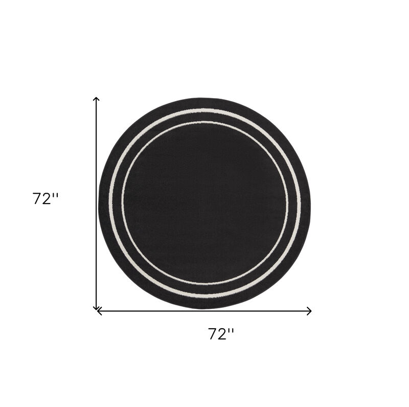 HomeRoots 6' Black And Ivory Round Indoor Outdoor Area Rug image number 4