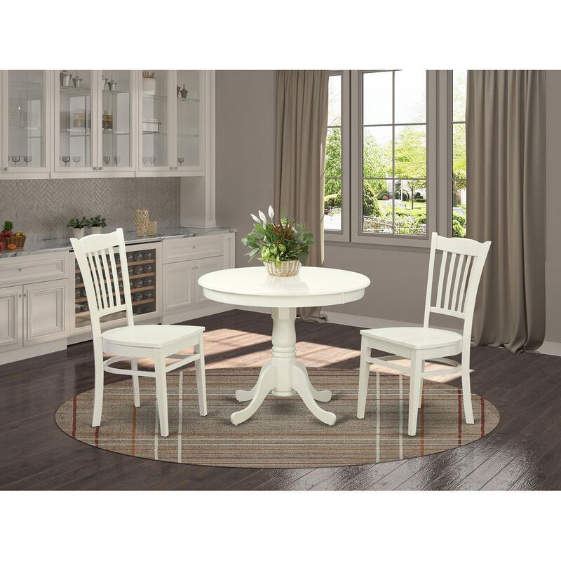 3 Pc set with a Table and 2 Wood Dinette Chairs in Linen White.