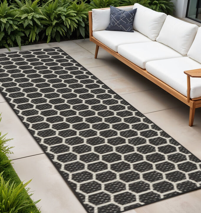 HomeRoots 10' Black And Ivory Geometric Indoor Outdoor Runner Rug
