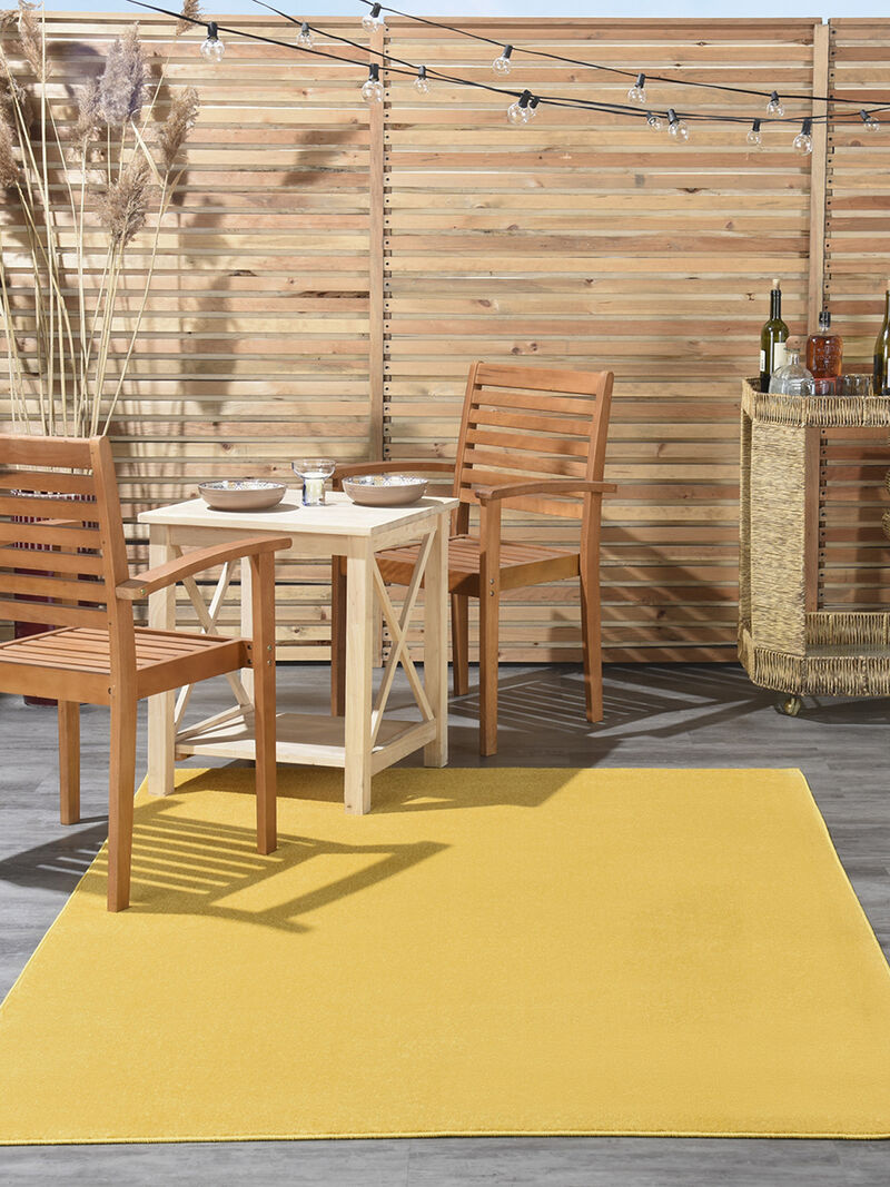 Nourison Essentials NRE01 Yellow 5' x 7' Rug image number 1
