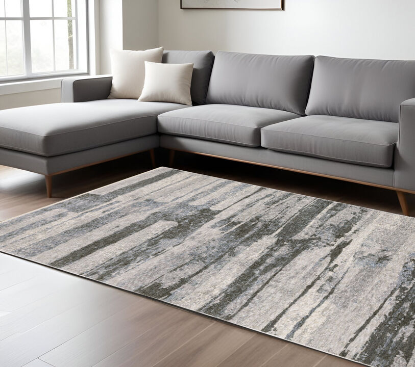 HomeRoots Abstract Area Rug With Fringe