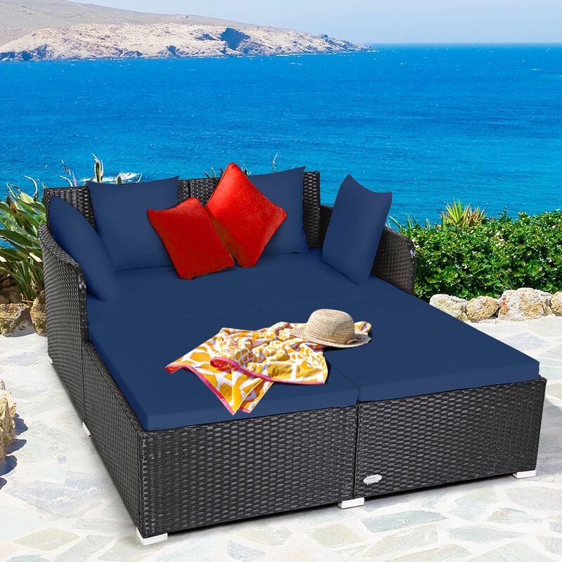 Mondawe Spacious Outdoor Rattan Daybed with Upholstered Cushions and Pillows
