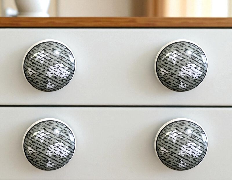 HomeRoots Set of Six White Poetic Script Ceramic Drawer Pull Knobs image number 1