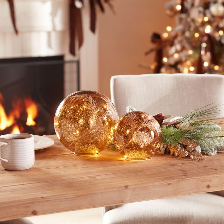 2-Piece LED Pinecone Globe Set – Winter Holiday Decor with Built-In Lights, Faux Pine, and Snow Accents for Mantel or Table