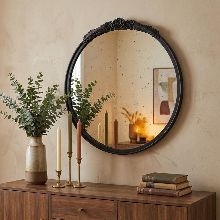 HomeRoots 30" Black Crowned Top Antiqued Glass Round Framed Accent Mirror