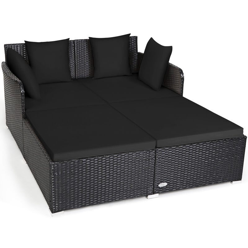 Outdoor Woven Rattan Daybed with Deep Cushions and Multiple Pillows