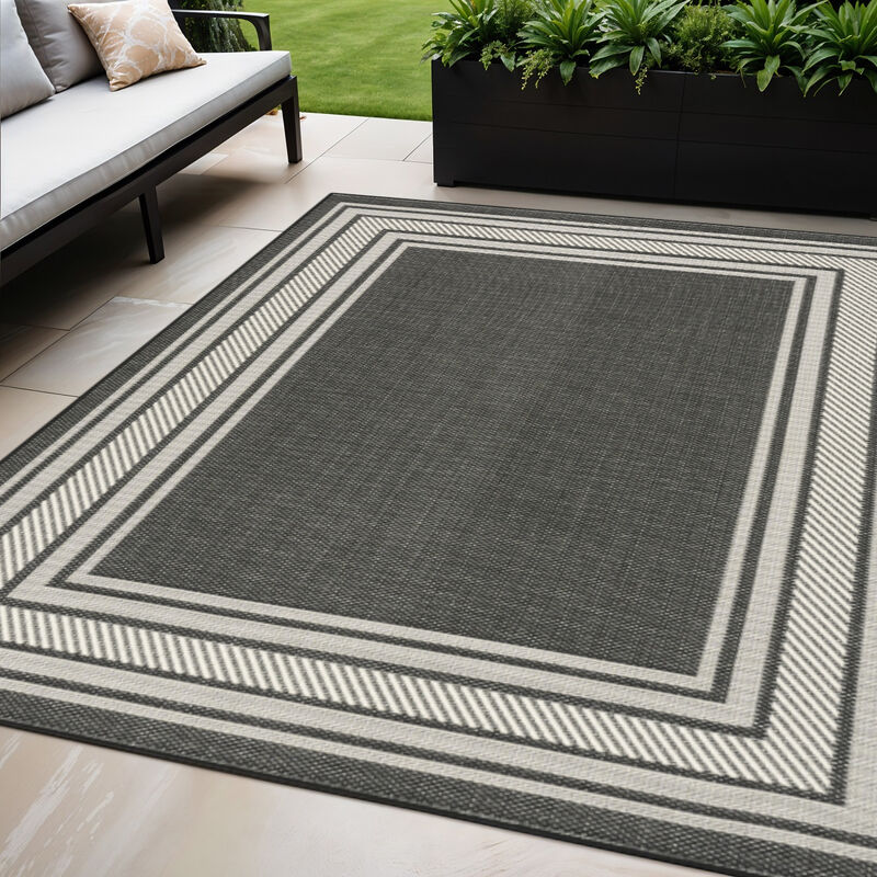 HomeRoots 5' X 7' Black Geometric Indoor Outdoor Area Rug image number 1