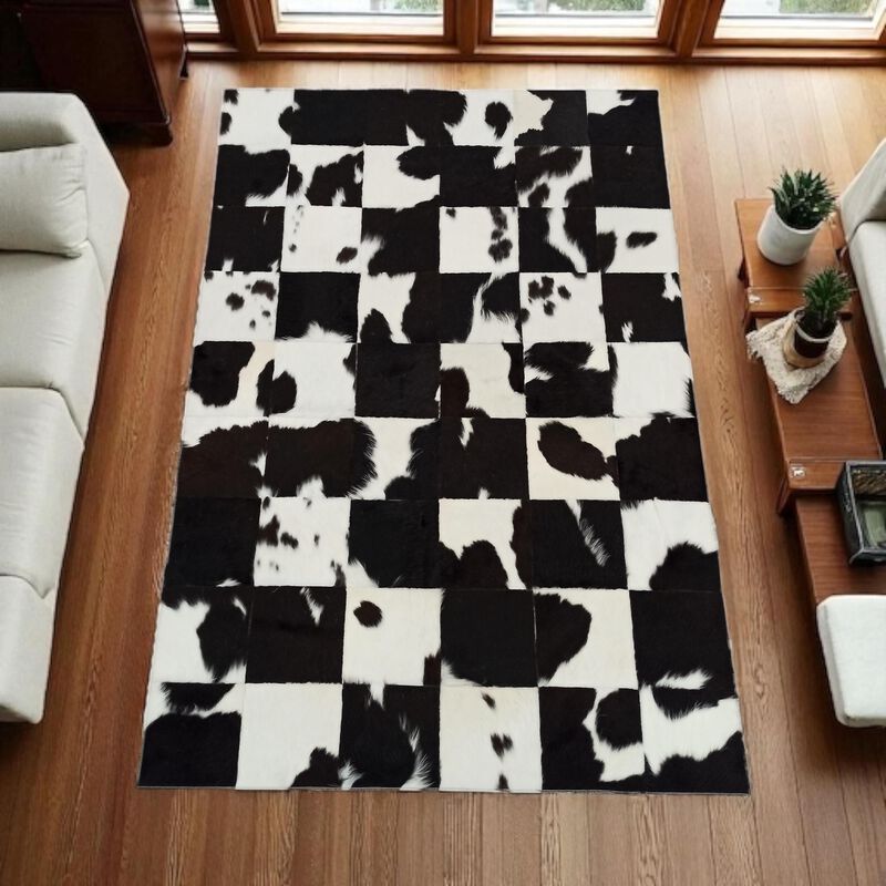 Black White Cowhide Patchwork Rug image number 1