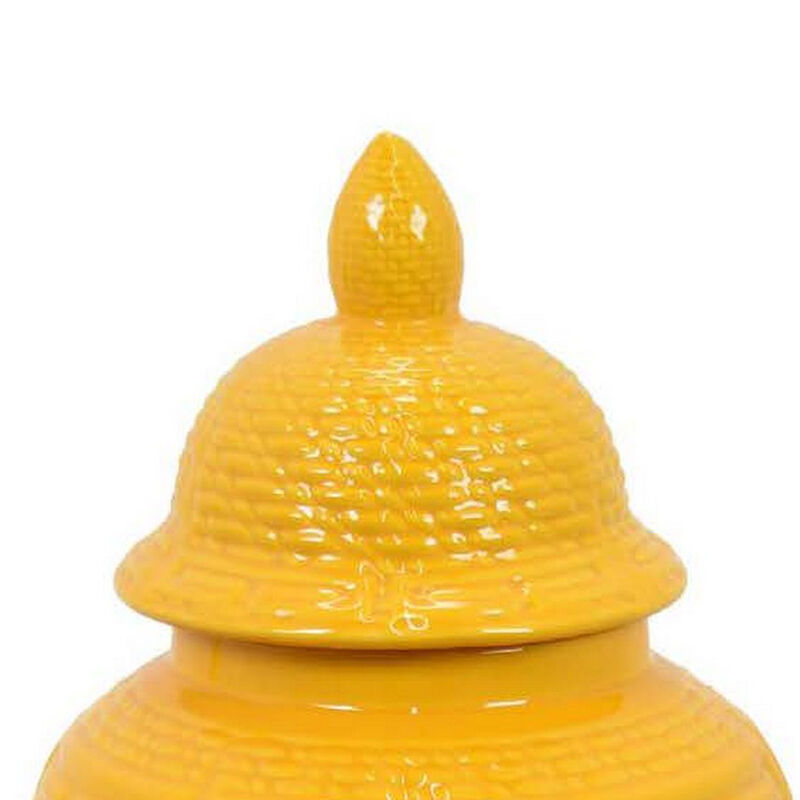 Bryan 18 Inch Ceramic Temple Jar, Geometric Print, Finial Top, Yellow - Benzara